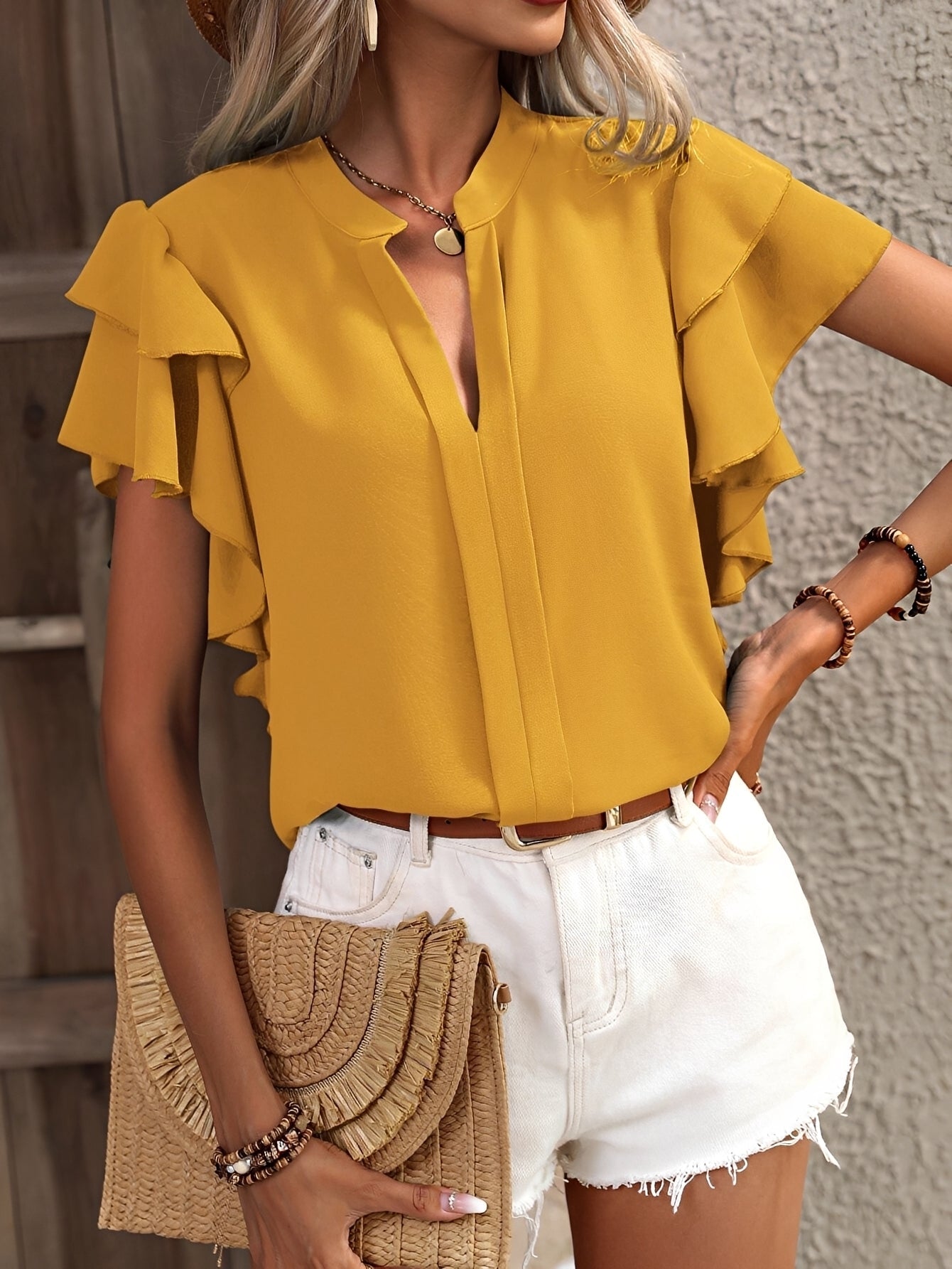 Louisa - Blouse sans manches avec col en V